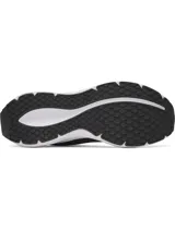 Championes de running Under Armour modelo Ascend, color negro con entresuela blanca. Presentan una parte superior de malla transpirable y ligera con tecnología Charged Cushioning para una mayor amortiguación y capacidad de respuesta.