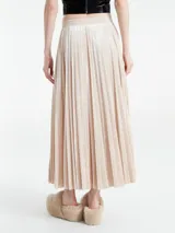 Falda midi de terciopelo con diseño plisado y cintura elástica, de corte acampanado.