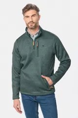 Buzo de felpa con interior de polar, diseño de medio cierre frontal, cuello alto y bolsillos laterales y en el pecho con cierres.