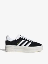 Zapatillas Adidas Gazelle Bold para mujer, color negro con las tres tiras blancas y plataforma de triple capa color crema.