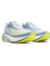 Championes de running Under Armour Velociti Distance, de color celeste con detalles en amarillo flúor, blanco y gris. Diseñados para carreras de larga distancia, cuentan con amortiguación UA HOVR+ y parte superior de malla transpirable.