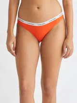 Bombacha clásica color naranja con cintura elástica blanca con logo Calvin Klein.