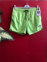 Short de baño verde flúor de la marca Reef, modelo V20 Blendcut Volley.