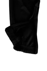 Pantalon deportivo Puma modelo Cap Poly Training de color negro, con el escudo del Club Atlético Peñarol y el logo de Puma en blanco.