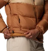 Campera puffer Columbia modelo Puffect II con diseño colorblock en tonos marrones y crema. Cuenta con cuello alto, cierre frontal completo, bolsillos laterales con cremallera y puños elásticos. Confeccionada con aislamiento térmico Thermarator y tecnología repelente al agua.