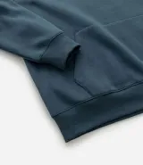 Buzo con capucha de corte relajado, confeccionado en algodón con felpa. Presenta bolsillo tipo canguro, cordón ajustable en la capucha y estampa gráfica de lettering en el pecho.