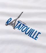 Remera de corte boxy color blanco, con cuello redondo y manga corta. Presenta un estampado artístico en la espalda con diversos personajes y elementos de la película Ratatouille.