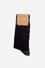 Media marrón con puntera y talón en gris oscuro. Tejido acanalado. Marca Brookfield Torino.