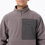 Buzo polar de microfleece con media cremallera frontal, cuello alto y bolsillo en el pecho con cierre. Presenta un panel de contraste en nylon ripstop en la parte superior y puños con ajuste elástico.