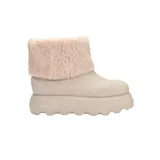 Botas de caña corta marca Melissa, color beige, con plataforma dentada y detalle de piel sintética en la parte superior de la caña.