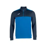 Campera deportiva Joma modelo Winner, con medio cierre frontal, color azul y detalles en azul marino.