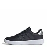 Championes urbanos Adidas Court Block, color negro con suela blanca. Presentan un diseño clásico con las tres tiras laterales características de la marca, confeccionados en cuero sintético con puntera perforada y cierre de cordones.