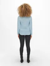 Sweater de punto con cuello redondo y manga larga, de corte regular y textura suave.