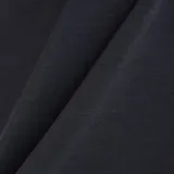 Remera deportiva negra de corte cropped, mangas cortas y logo de New Balance estampado en el pecho.