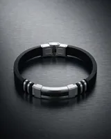 Pulsera masculina de diseño moderno, combinando eslabones de acero inoxidable con una banda central de goma negra trenzada. Cuenta con un cierre de seguridad metálico integrado.