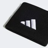 Par de muñequeras deportivas Adidas, color negro, con el logo de las tres barras bordado en blanco.