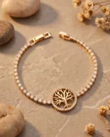 Pulsera de acero dorado con diseño central del Árbol de la Vida rodeado de circonias, y cadena ajustable con incrustaciones de piedras brillantes.