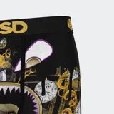 Calzoncillos bóxer de la marca PSD, con diseño de billetes de dólares, diamantes, cadenas de oro y un monstruo con dientes afilados.