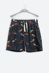Short de baño negro con estampado de sirenas color naranja y amarillo. Tiene cintura elástica con cordón ajustable y bolsillos laterales.