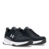 Championes deportivos Under Armour modelo Charged Edge, color negro con detalles en blanco y gris. Presentan cierre con cordones, logo de la marca en el lateral y suela con tecnología Charged Cushioning para mayor amortiguación.