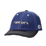 Gorra Rip Curl azul con visera negra y costuras blancas contrastantes. Presenta el logo de la marca bordado en el frente y lateral, y ojalillos bordados.