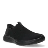 Championes deportivos Umbro modelo Flex Lady, color negro, de diseño slip-on con tejido de punto elástico y suela con textura geométrica.