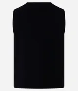 Chaleco Marfinno de corte recto y largo, confeccionado en tricot. Presenta cuello en V, cierre frontal con botones y diseño liso sin estampados.