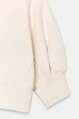 Sudadera crop de algodón con cuello redondo y mangas cortas abullonadas con puños ajustados.