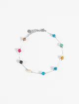 Tobillera plateada de acero con cuentas de piedra de colores engarzadas.