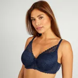 Sujetador azul marino con relleno, copas D y E, breteles regulables y detalle de moño en el centro.