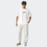 Pantalón de felpa gris melange de corte wide leg, con cintura elástica y bolsillos laterales.