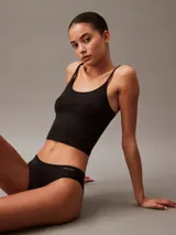 Bombacha Calvin Klein negra de microfibra elástica, con cintura elástica y logo de la marca en el lateral.