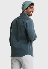 Camisa de pana azul marino de manga larga con cuello abotonado.