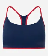 Top deportivo Get Over de corte nadador, confeccionado en microfibra azul marino con detalles en color rojo en los bordes y breteles. Presenta escote en U y copas integradas.