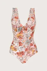 Traje de baño entero con estampado floral en tonos naranja, amarillo, celeste y rosa. Escote en V con detalle fruncido en el busto.