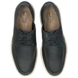 Zapato casual de cuero azul navy tipo náutico, con cordones y suela de goma blanca.