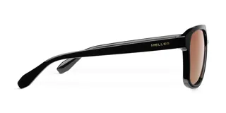 Lentes de sol de aviador con montura negra oversized y doble puente. Lentes marrones de nylon con protección UV400.