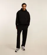Pantalón deportivo Get Over de corte recto, color negro, confeccionado en mezcla de poliéster, viscosa y elastano. Cuenta con cintura elástica con cordón de ajuste y bolsillos laterales.