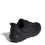 Championes de trekking Adidas Terrex Anylander, color negro, con diseño de malla transpirable y refuerzos sintéticos. Presentan suela con relieve para mayor tracción y logo Terrex en la lengüeta y el talón.