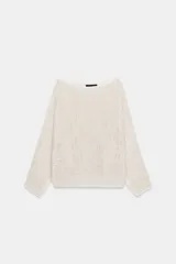 Jersey de punto con cuello barco y mangas anchas de corte holgado.