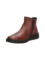 Bota corta de cuero color marrón, estilo Chelsea, con paneles elásticos laterales y suela gruesa con hendiduras.
