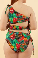 Malla entera de lycra estampada con diseño tropical, de un solo hombro y con aberturas en la cintura.