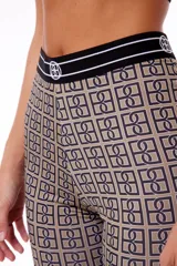 Pantalón bootcut de polisap con estampado celebrity y elástico negro con logo tejido en la cintura.