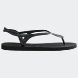 Ojotas Havaianas modelo Luna, color negro, con diseño de tiras trenzadas que se entrelazan en la parte delantera y correa trasera para mayor sujeción.