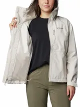 Campera impermeable Columbia modelo Hikebound II, color gris claro, con capucha ajustable, cierre frontal con solapa, bolsillos con cremallera y puños ajustables. Cuenta con tecnología Omni-Tech™ y costuras selladas.