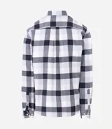 Camisa de corte comfort confeccionada en algodón, con estampado de cuadros en tonos marrón, beige y azul. Presenta cuello camisero, mangas largas con puños abotonados y cierre frontal con botones.