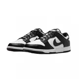 Championes Nike modelo Dunk Low Retro, en colores blanco y negro, confeccionados en cuero sintético, con diseño clásico de perfil bajo, suela de goma y cordones al tono.