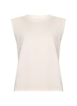 Musculosa blanca de tejido de punto, con corte holgado, cuello redondo y sisas amplias.