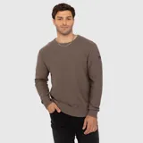 Sweater de punto color marrón, de manga larga, con cuello redondo y puños y dobladillo en rib elástico.