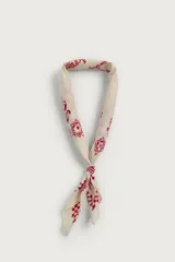 Bandana de algodón color verde oscuro con estampado gráfico y geométrico en blanco.